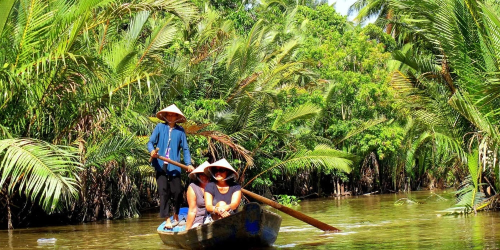 Hand-rowing Sampan Mekong Delta